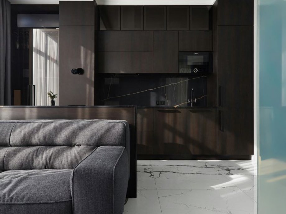 Dark kitchen with marble floor